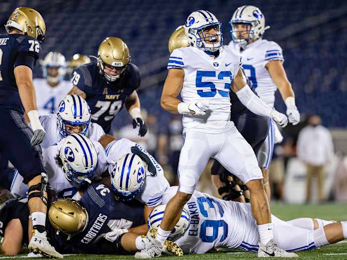 BYU celebrates a defensive play against Navy